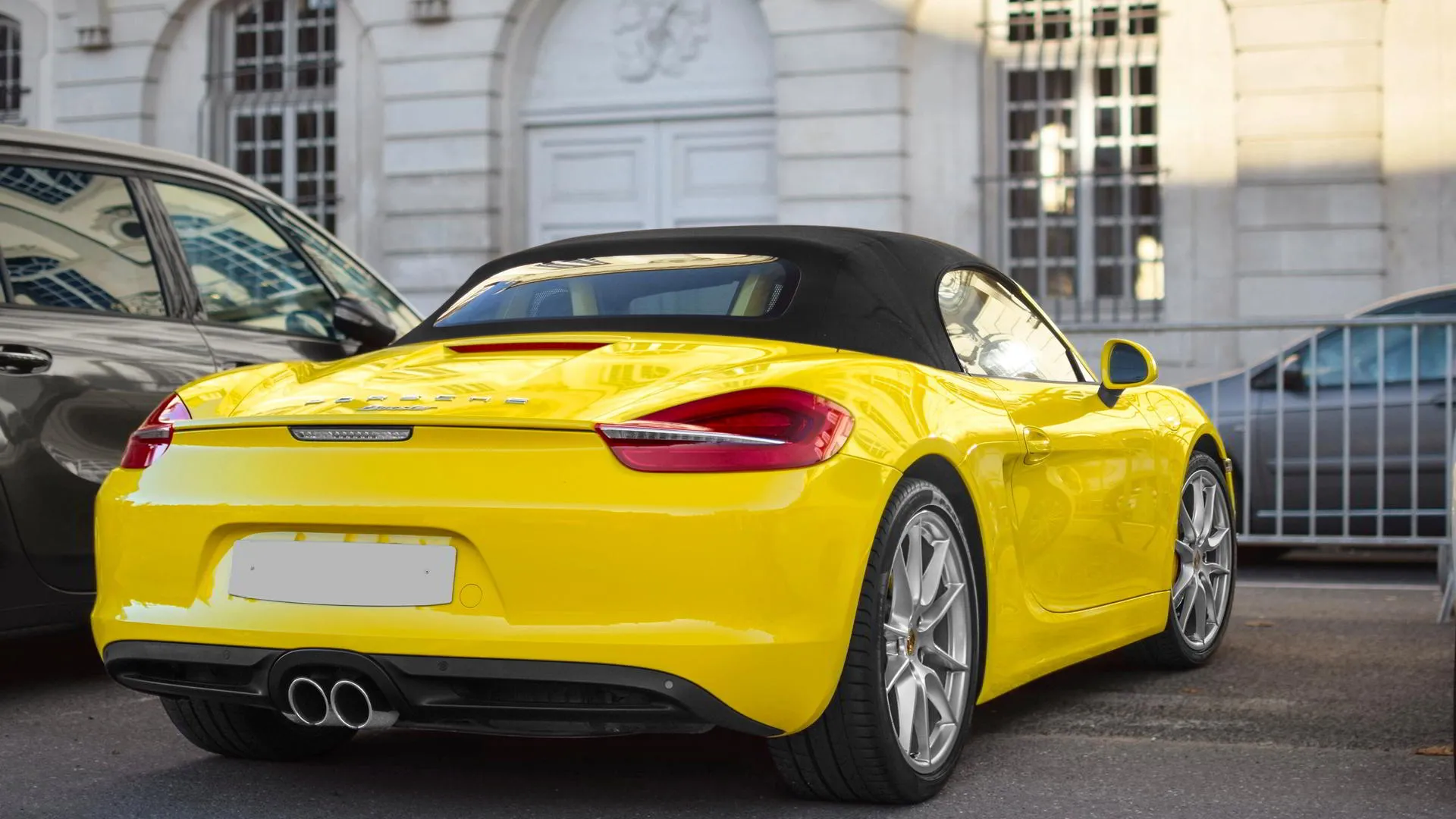 porsche boxster yellow luxury car rental service by Luxorides